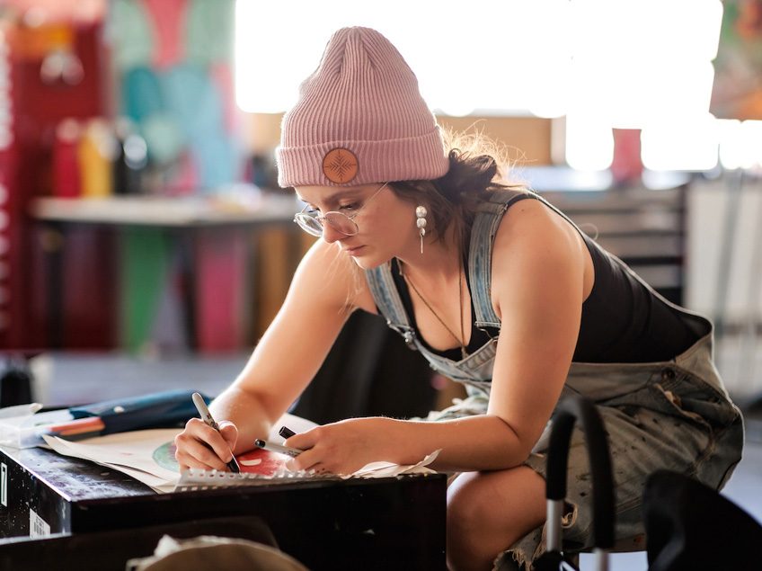 MSU Denver student, Katelin Knudsen, works on a project in Painting and New Contexts class on May 3, 2023. Photo by Alyson McClaran