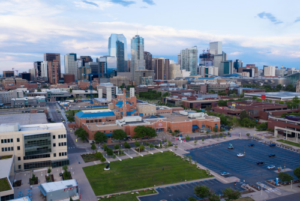 Campus aerial with downtown Denver in background