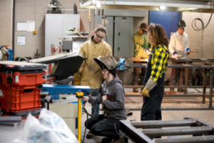 Students work on welding