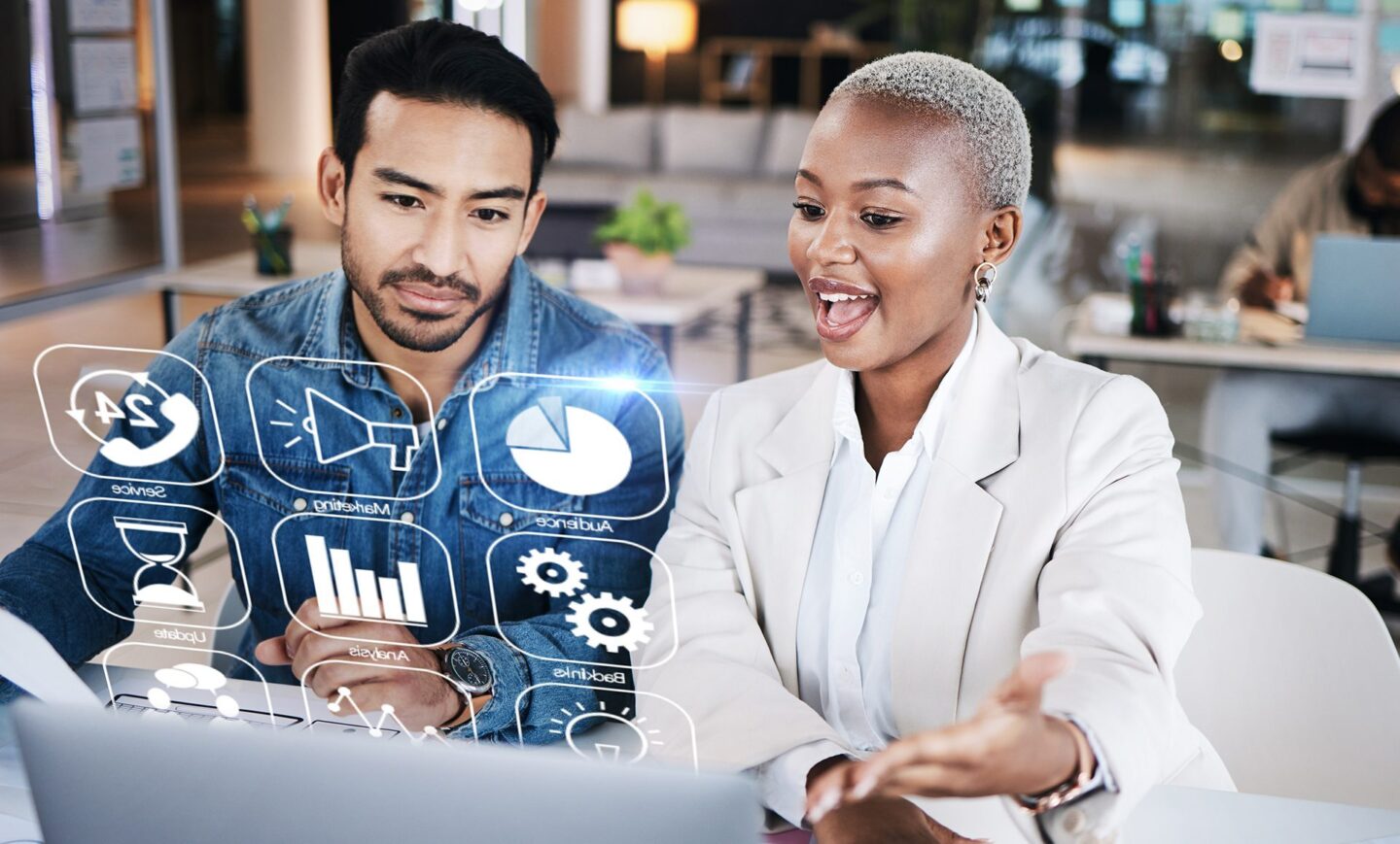 Two people working on a presentation