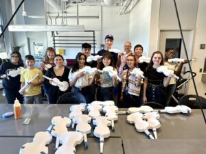 Students and high schoolers help make 3D printed violins at MSU Denver.