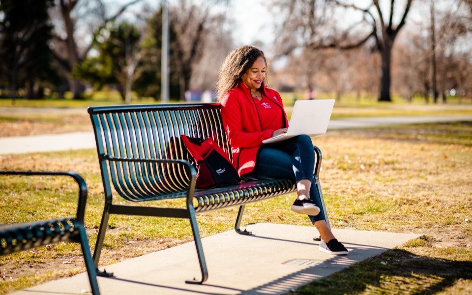 MSU Denver Online student studying remotely for a business intelligence degree