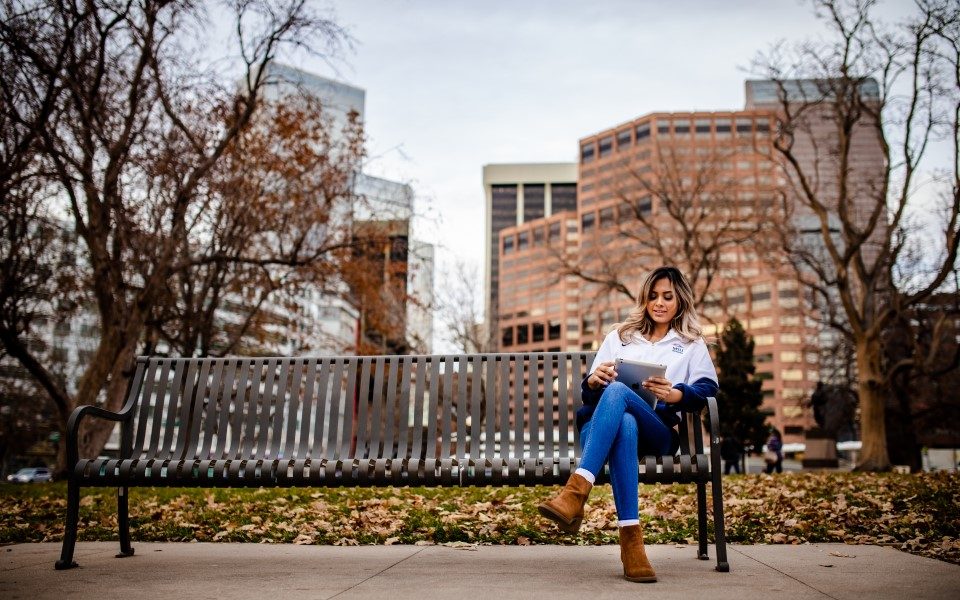 MSU Denver Online student studying remotely for a program with an international business degree concentration