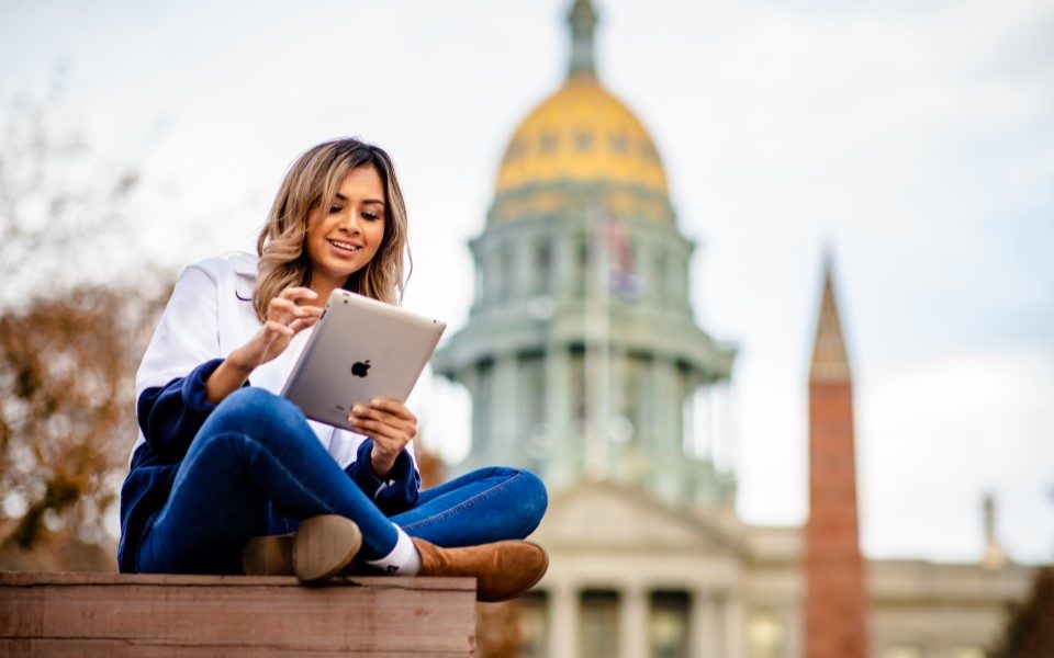 MSU Denver Online student studying remotely for an international business degree