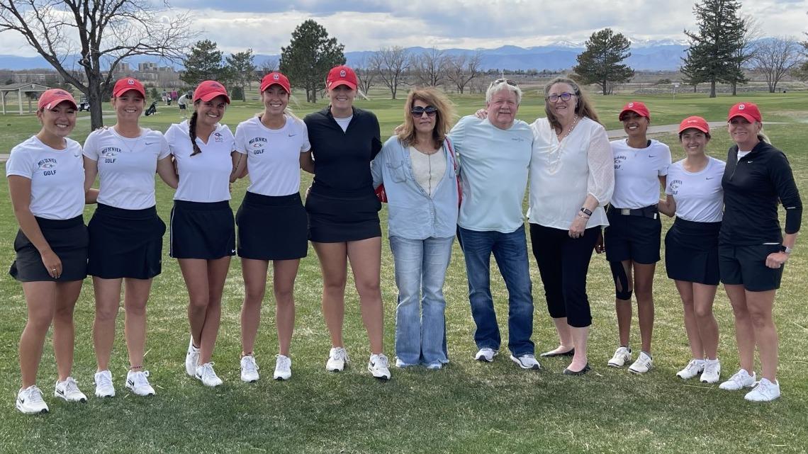 Members of the O'Neill family, including Tim O'Neill, pose with the MSU Denver women's golf team.