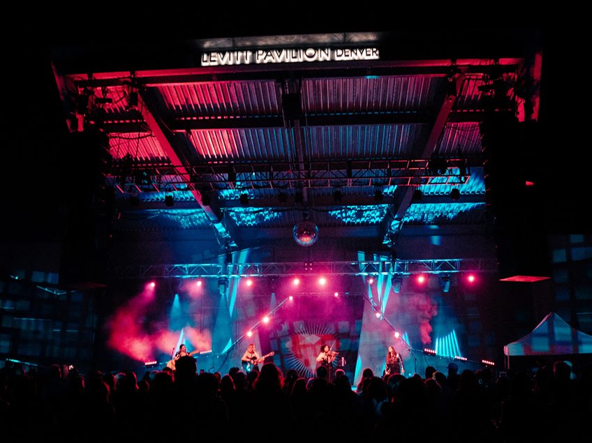 Flor de Toloache performing onstage at Levitt Pavilion