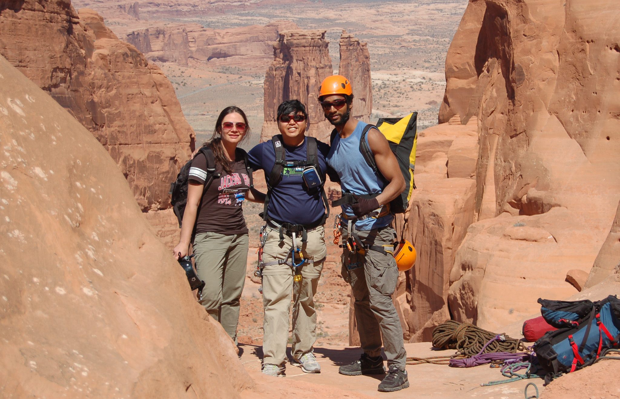 Three climbers in canyon country