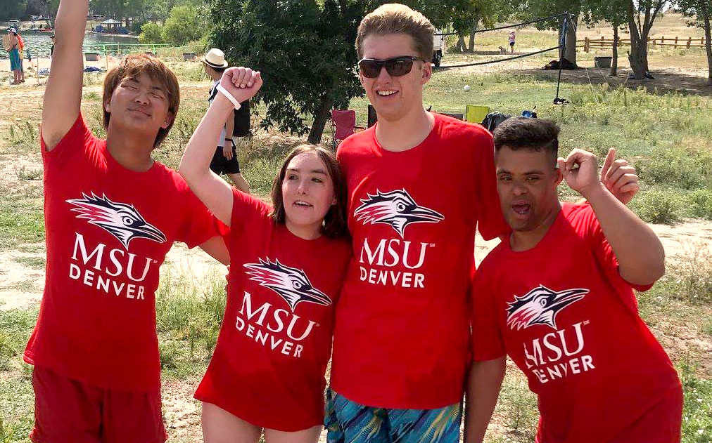 Decorative: Inclusive Higher Education students pose for a group photo in matching MSU Denver t-shirts in a park.