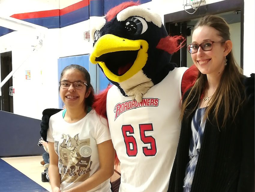 Decorative: Inclusive Higher Education students stand next to mascot Rowdy the Roadrunner