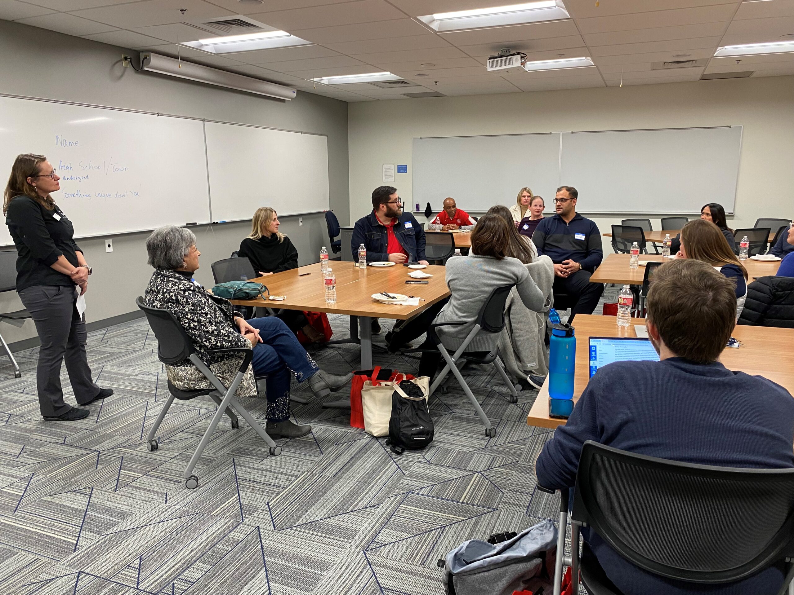 Candid shot of students and faculty at the New MPAcc Student Orientation (1/9/2024)