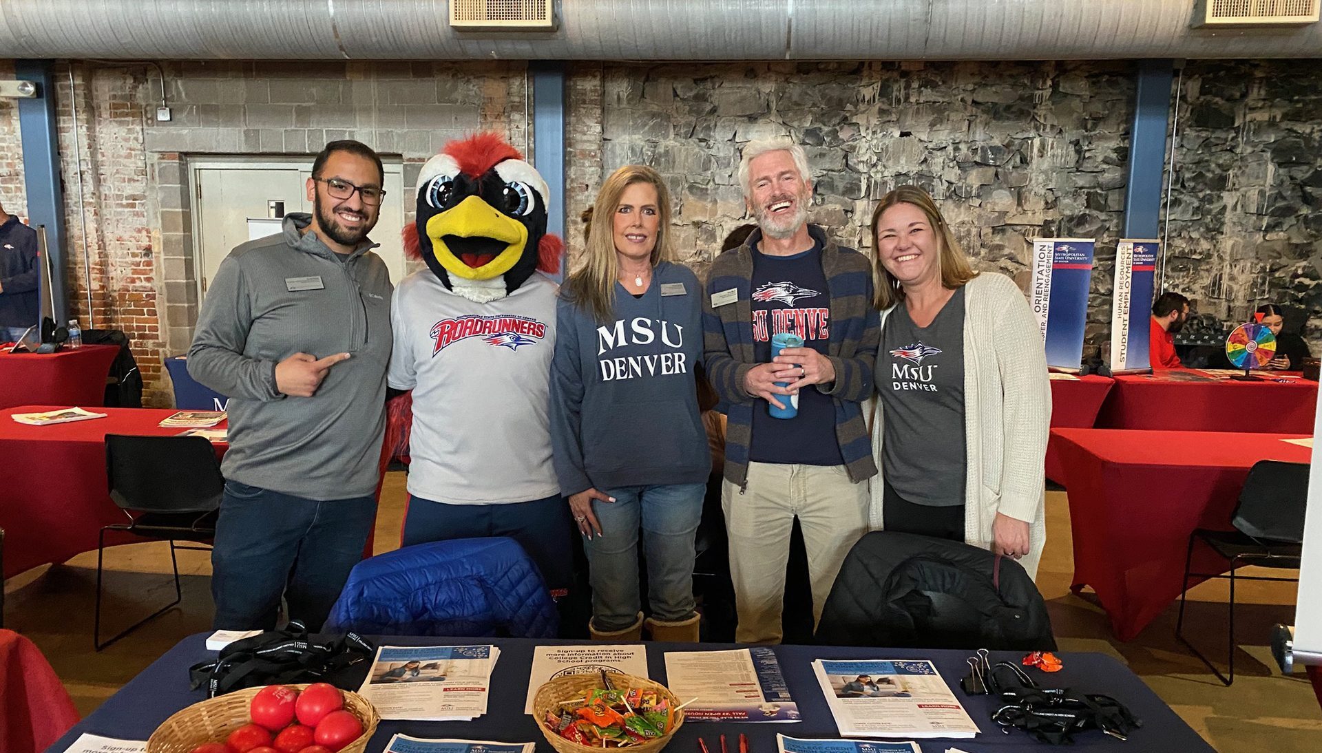 College Credit in High School team posing with Rowdy at an Open House on campus