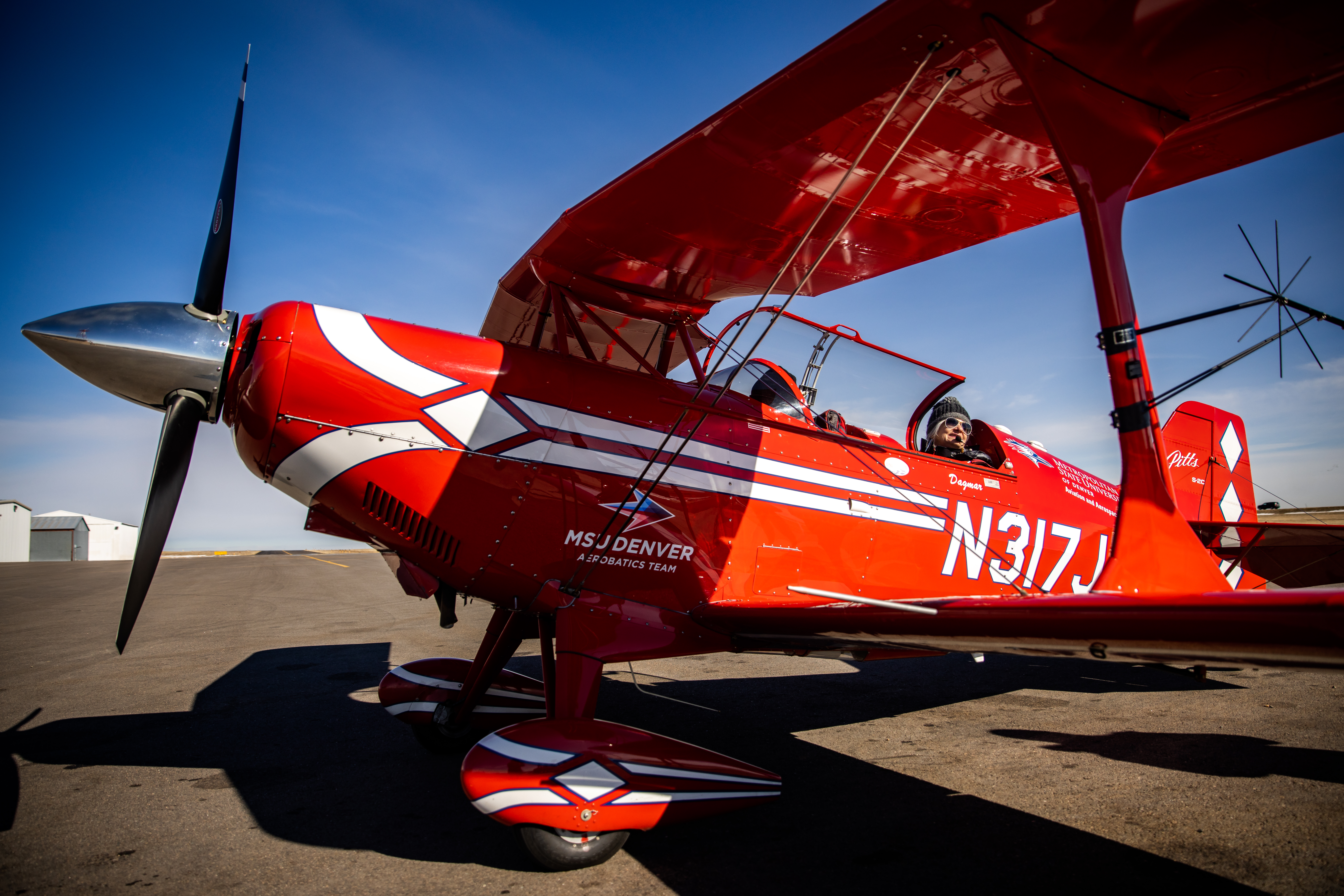 Dagmar Kress, Lecturer and Aerobatics Team Coach at MSU Denver Aviation and Aerospace Department and MSU Denver student, Haley Jo Brinson, return from a practice flight on Feb. 12, 2022 at Fort Morgan Municipal Airport. Photo by Alyson McClaran