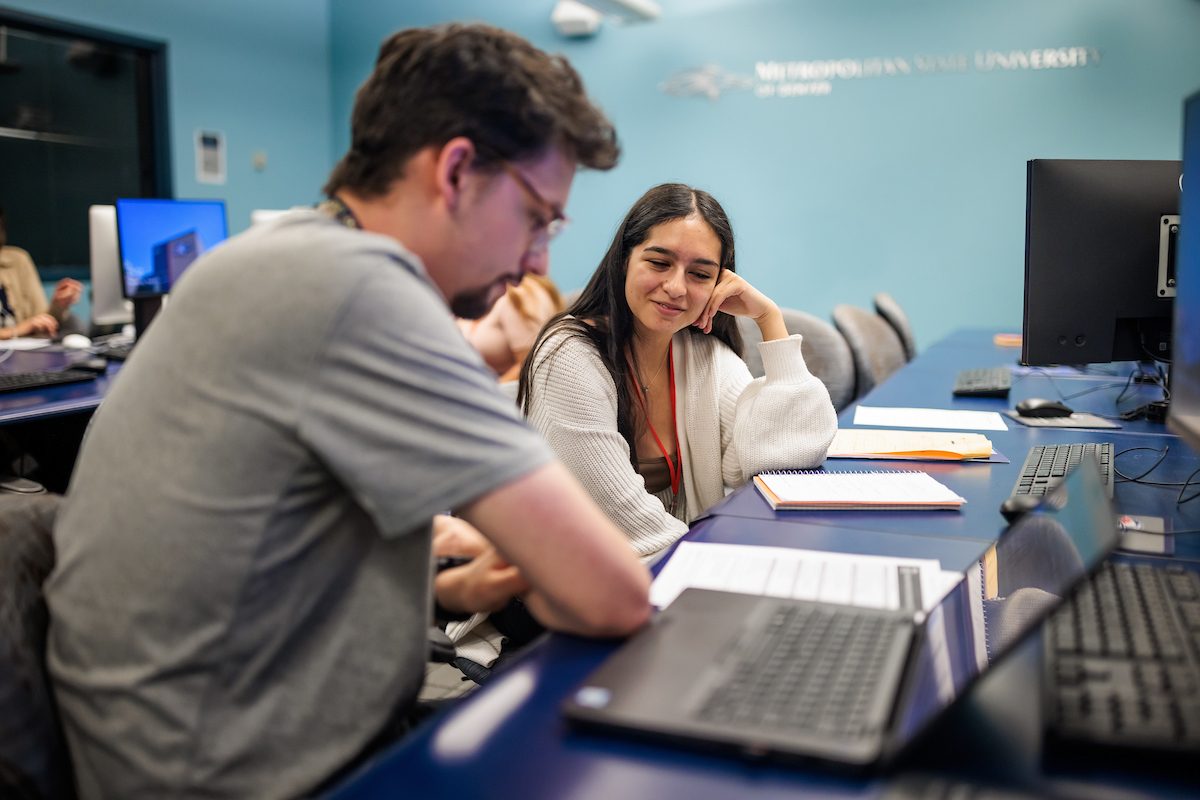 Incoming Veterans and transfer students speak with advisors during orientation at MSU Denver on Aug. 9, 2023. Photo by Alyson McClaran