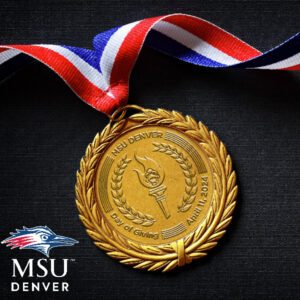 Social media profile image for Day of Giving with a gold medal on a black background
