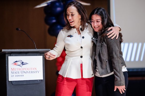 Dr. Davidson with her arm around student, Julianna Montoya