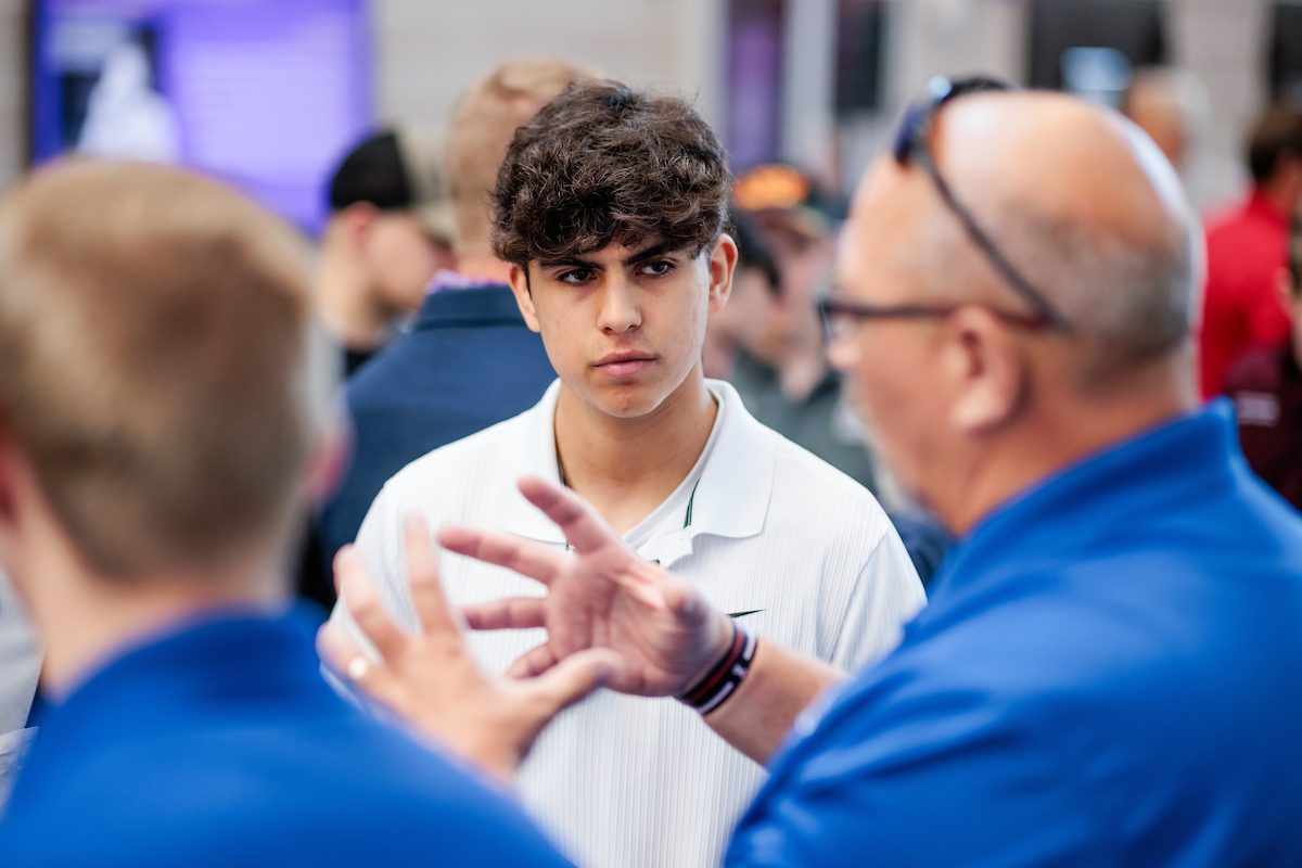 Students talk to different booths during the Aviation and Aerospace Science orientation on Aug. 18, 2023. Photo by Alyson McClaran