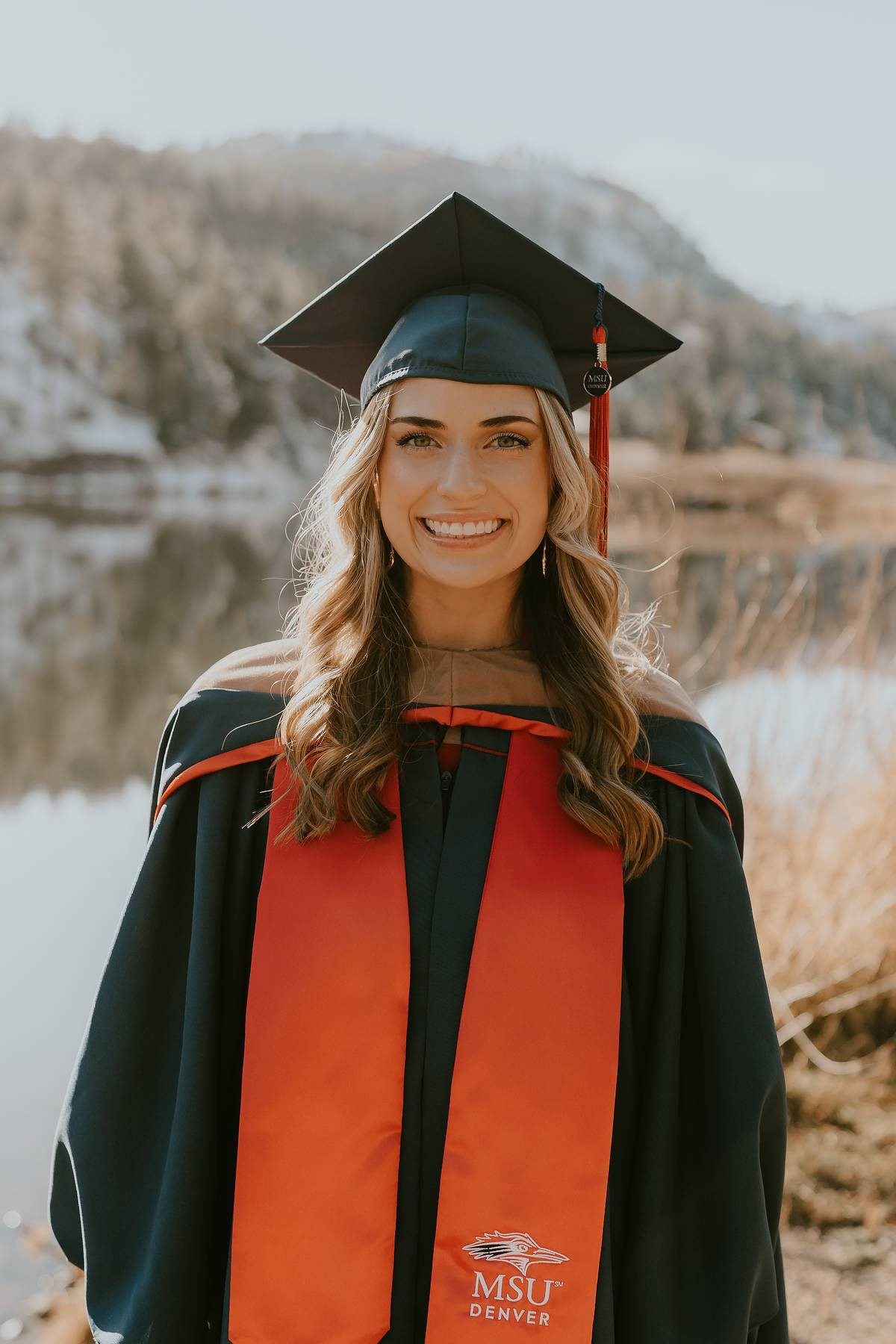 combined degree mpacc alum headshot in graduation regalia - Morgan Hendricks