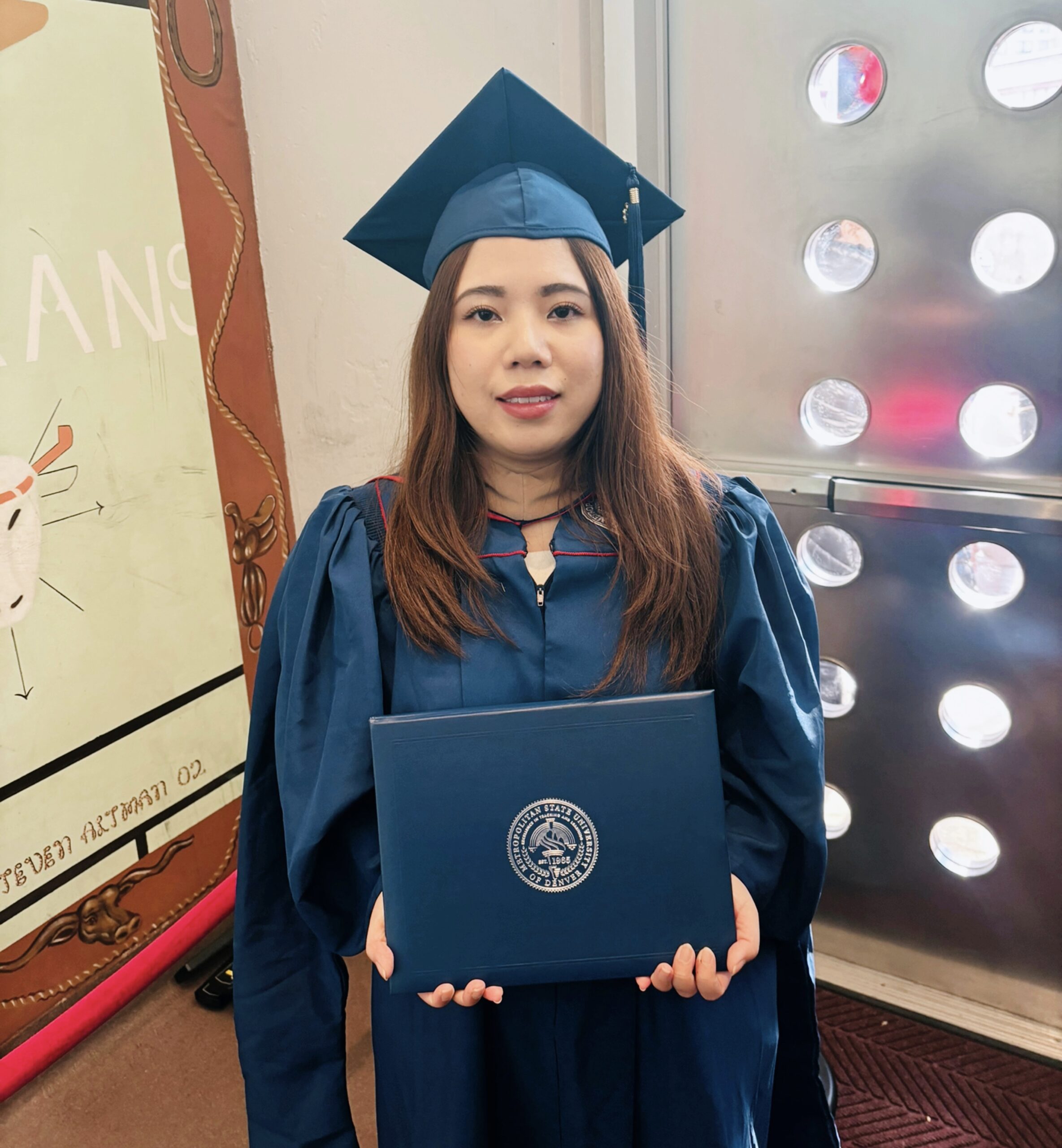 Thanh Cao, MPAcc alum '23, in graduation regalia