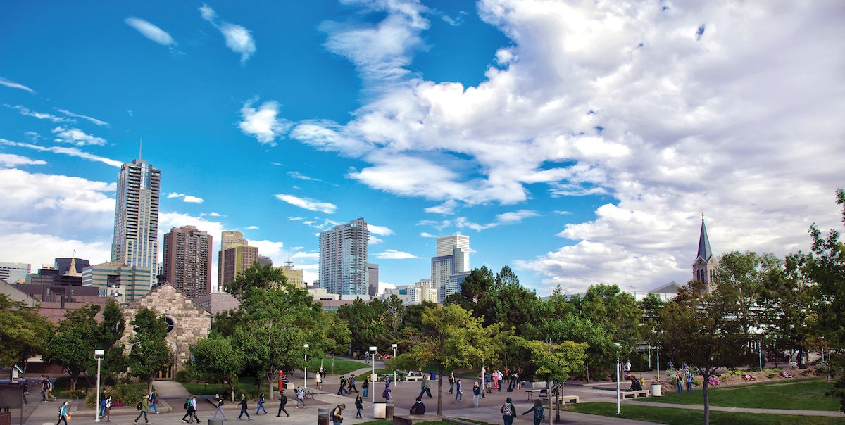 Denver skyline from campus on a sunny, blue sky day.