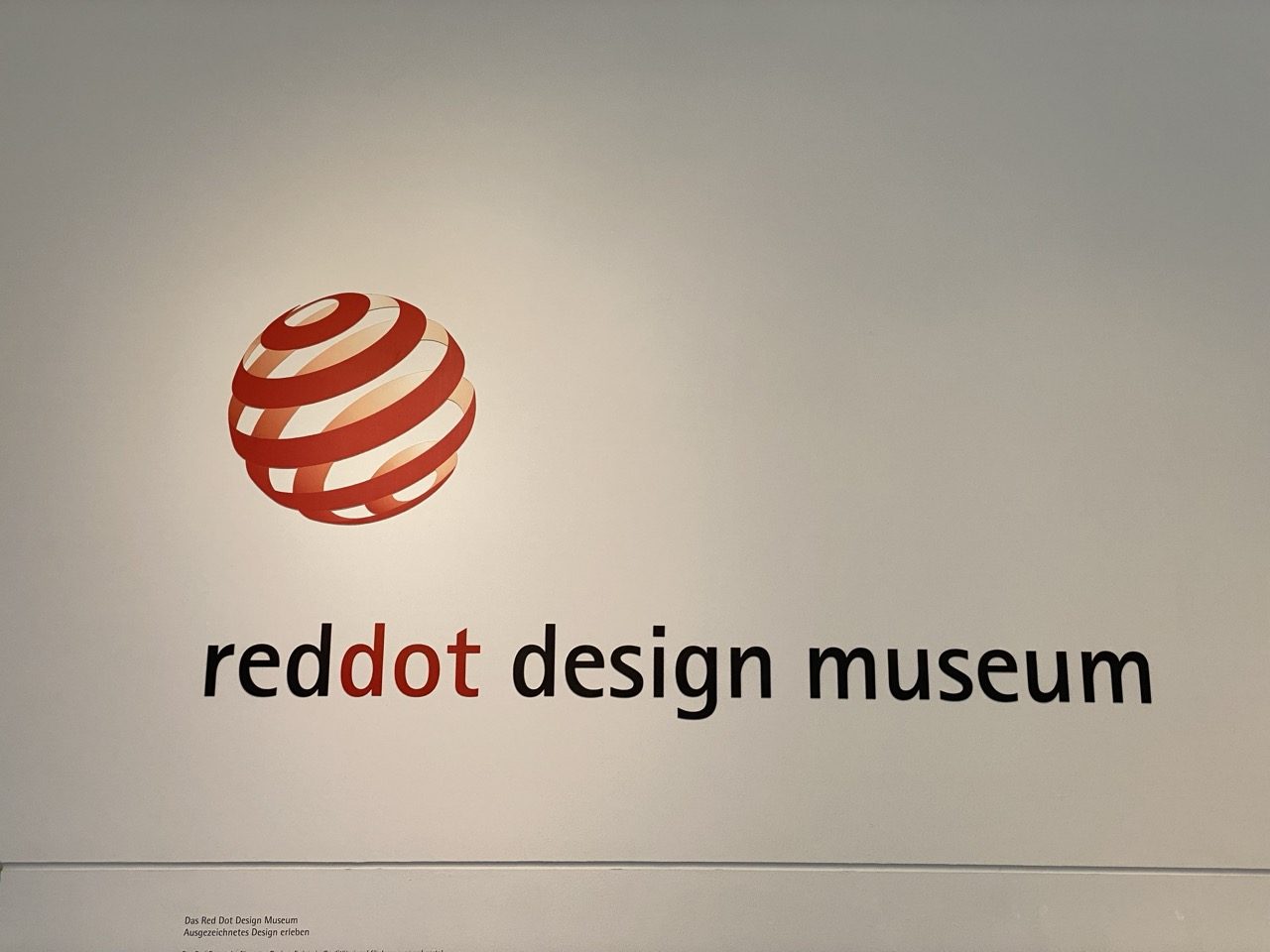 reddot design museum sign on wall