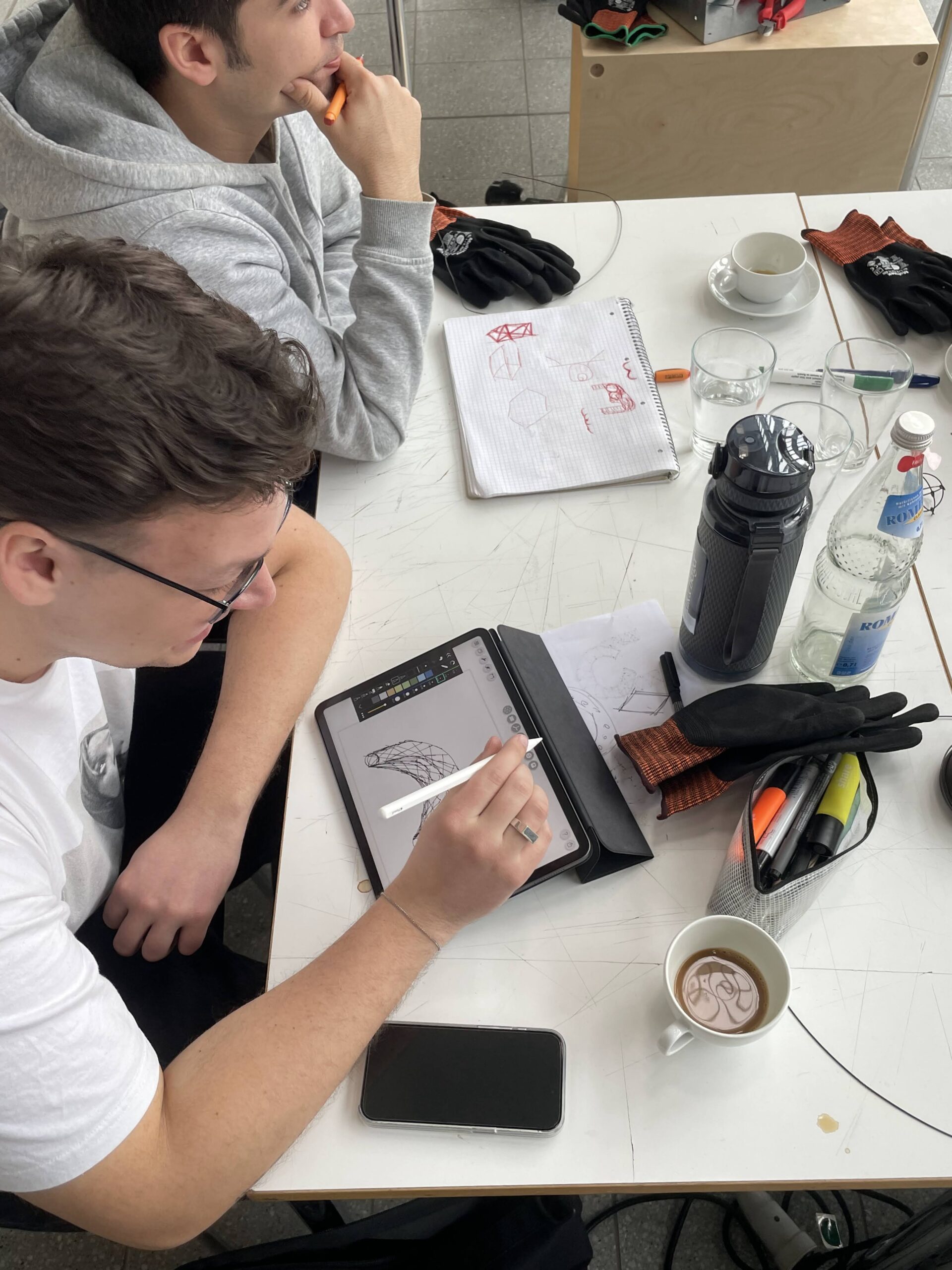 student working on ipad for design
