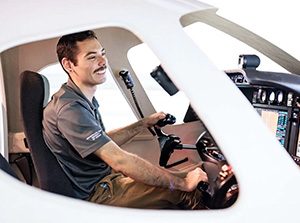 MSU Denver Aviation and Aerospace Science major Sebastian Steele trains on the state-of-the-art Cessna Mustang simulator on April 4, 2024. Photo by Alyson McClaran