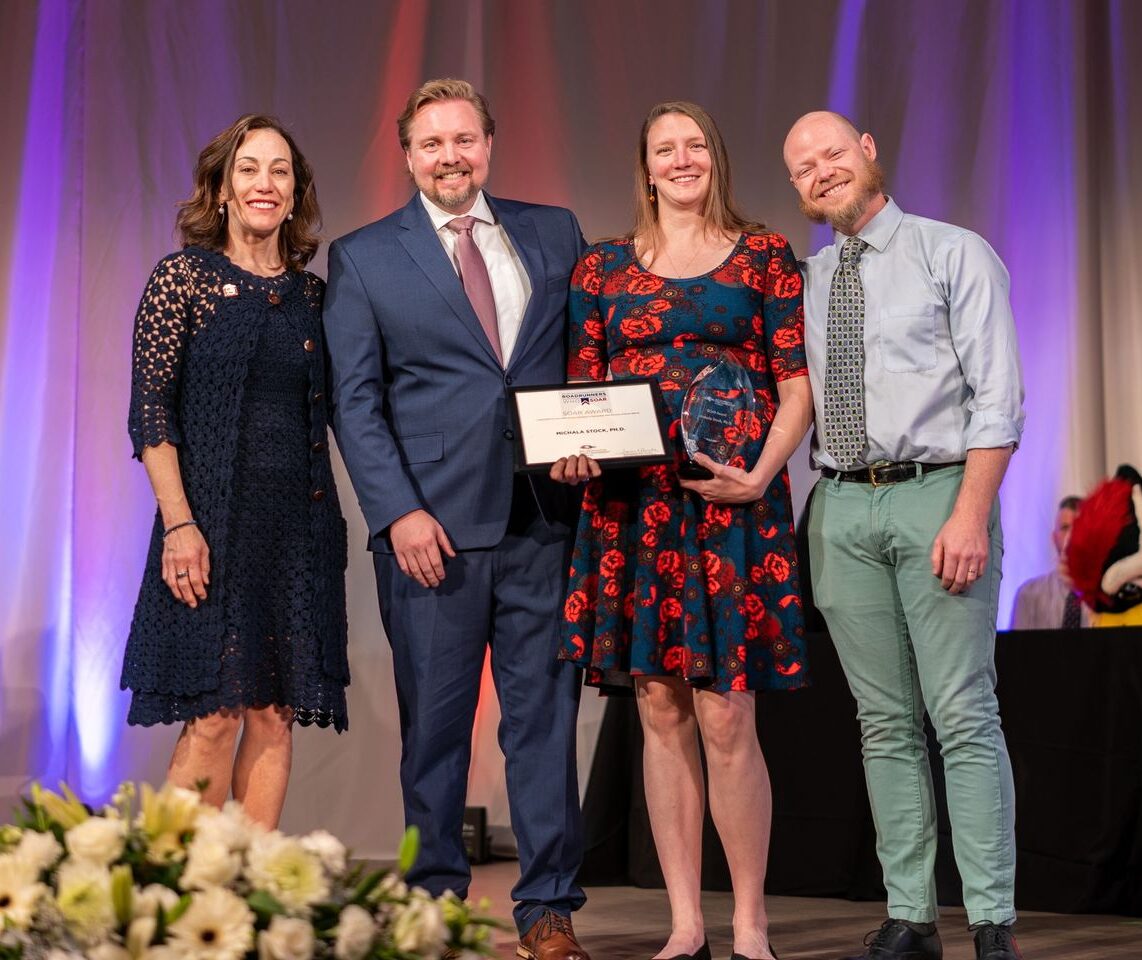 Dr. Michala Stock receiving a 2024 MSU Denver SOAR Award.