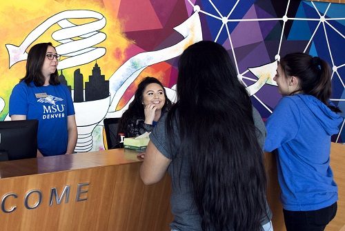 Student employees at help desk.