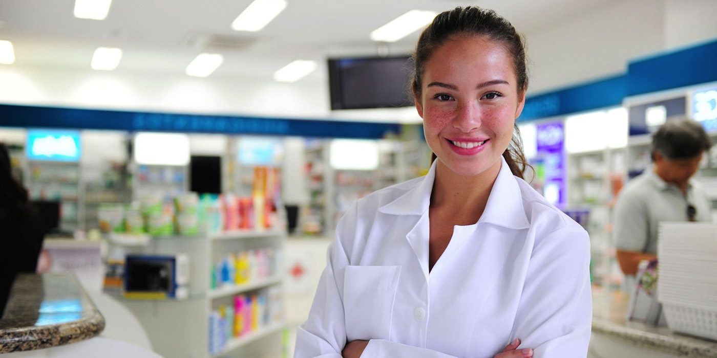 Woman working in Pharmacy as a Pharmacy Technician