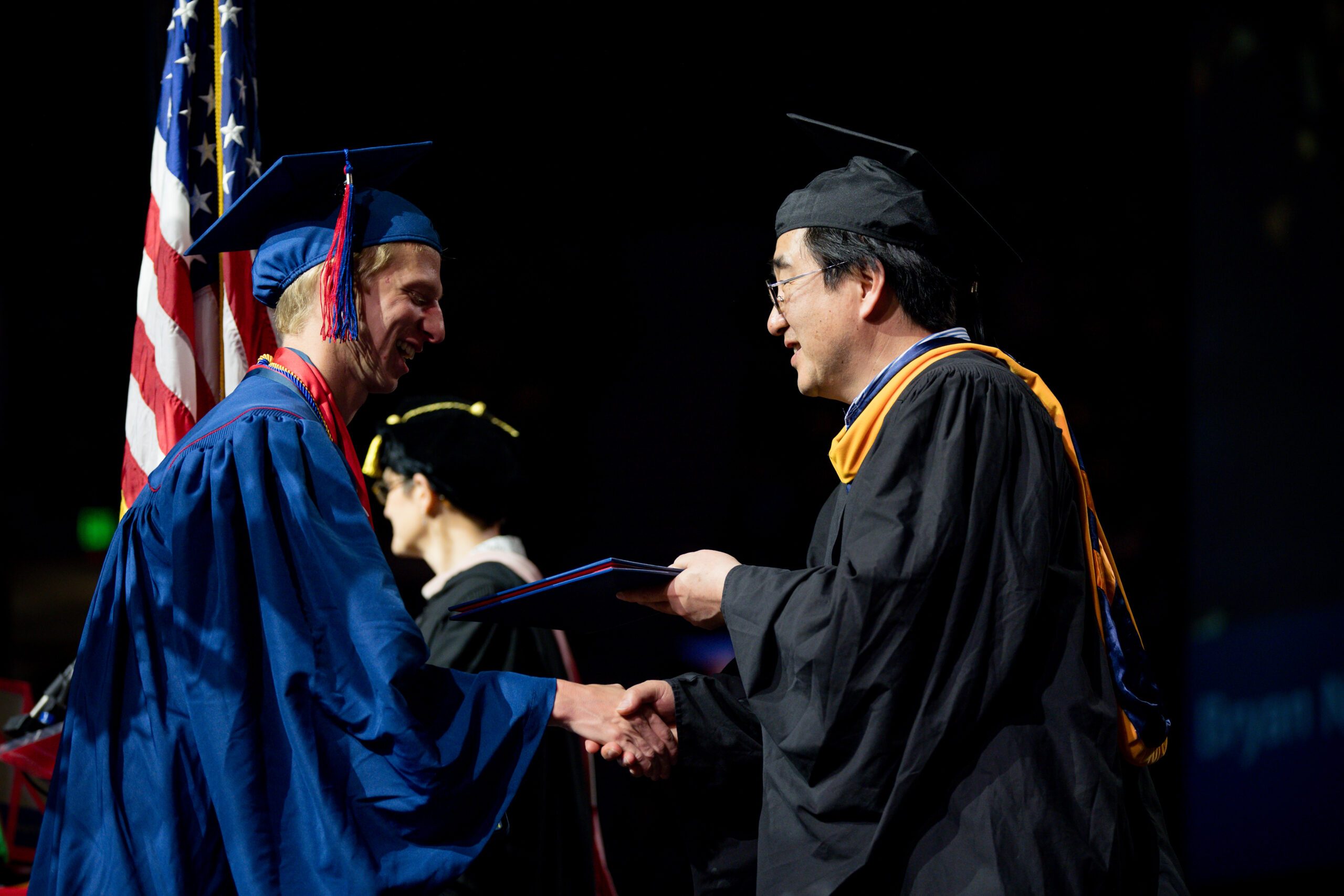 Industrial design chair Dr. Ted Shin with student at the Morning Ceremony.
