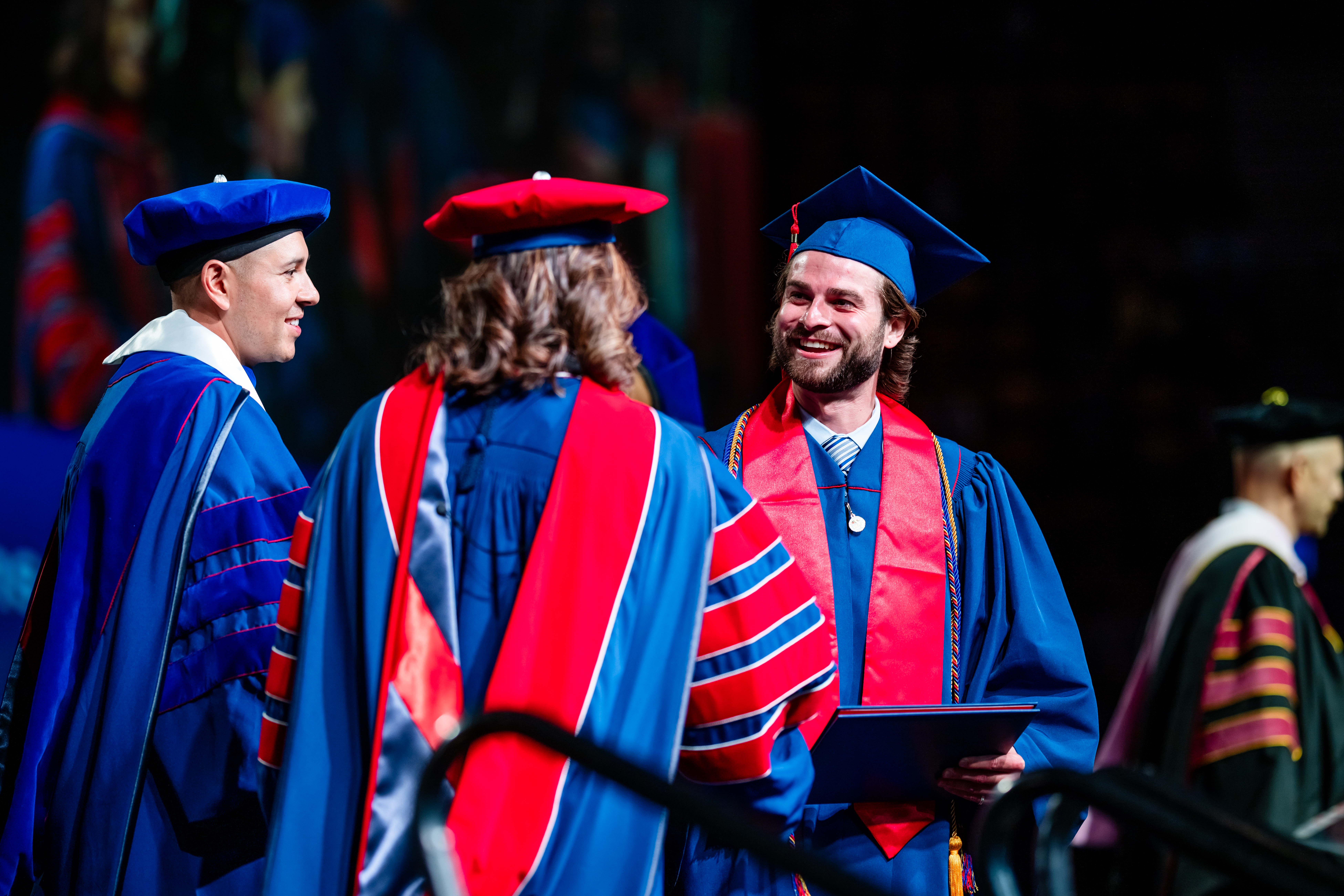 CACED student during the Morning Ceremony with Janine Davidson.
