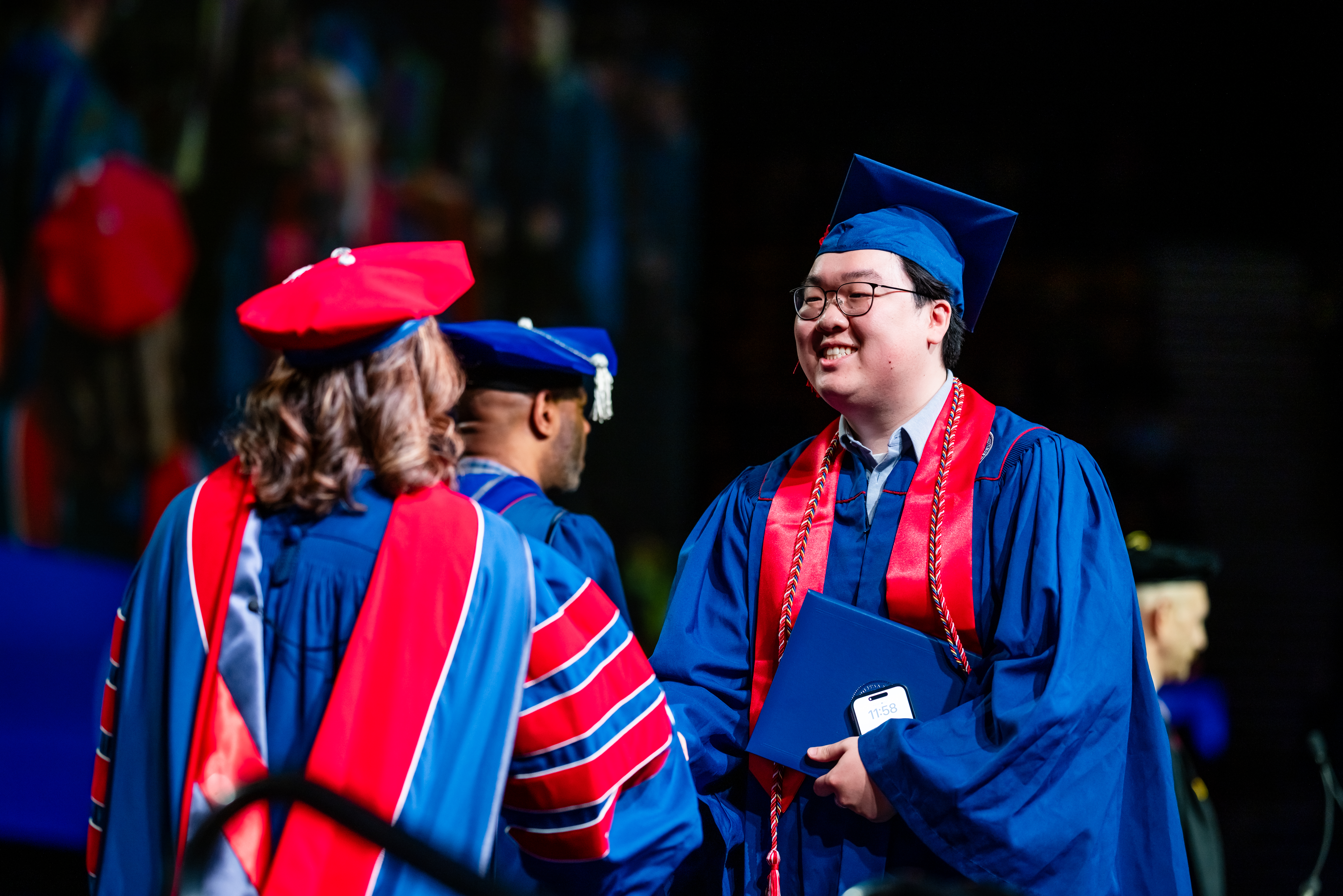 CACED student during the Morning Ceremony with Janine Davidson.