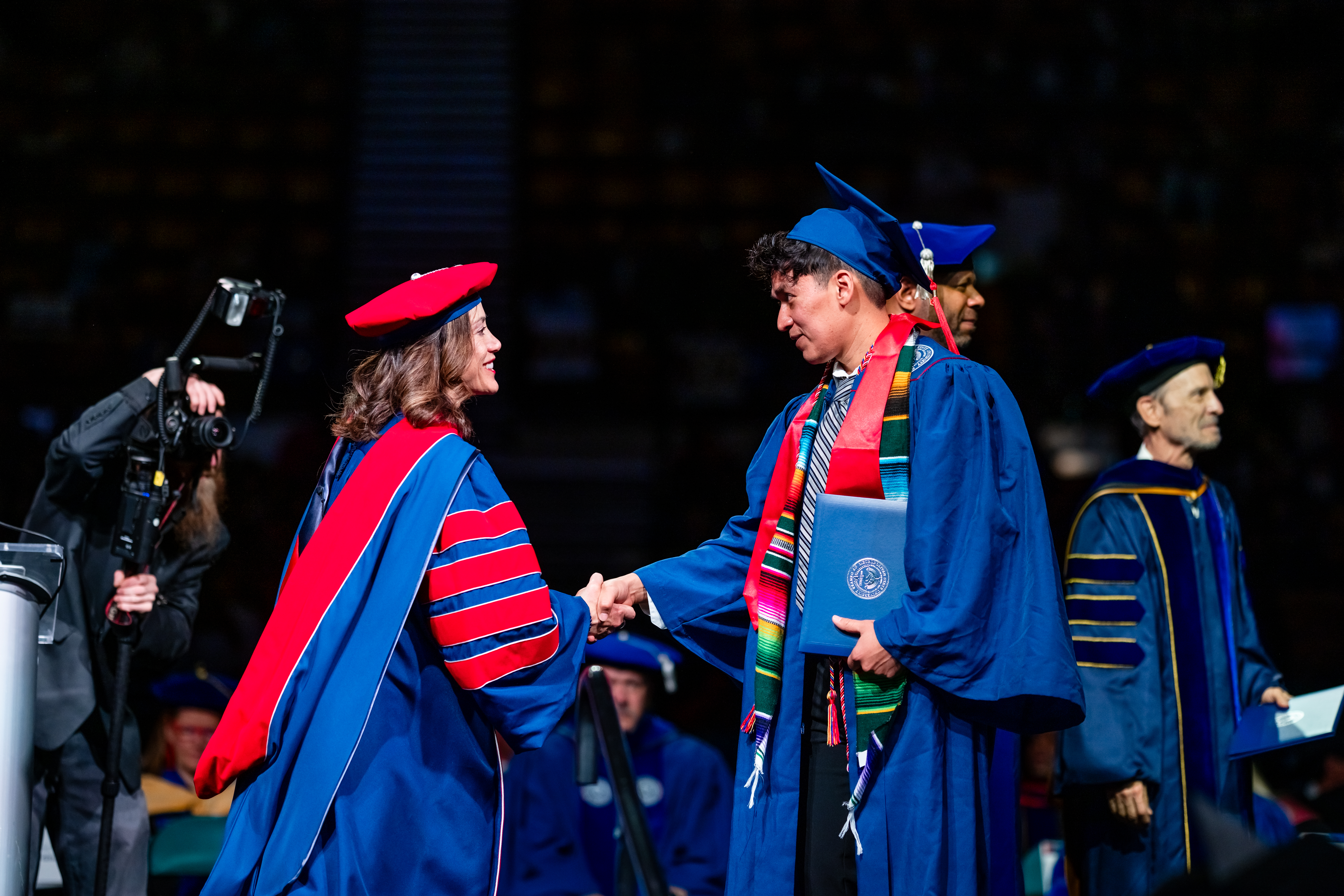 CACED student during the Morning Ceremony with Janine Davidson.