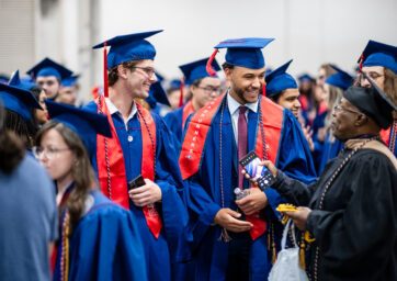 Picture of College of Business Students and staff at graduation.