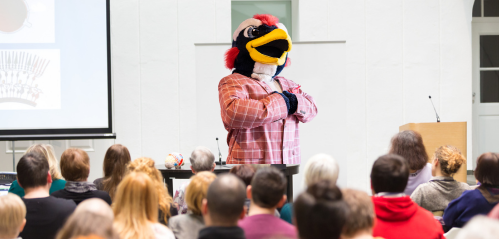 Rowdy teaches a conference.