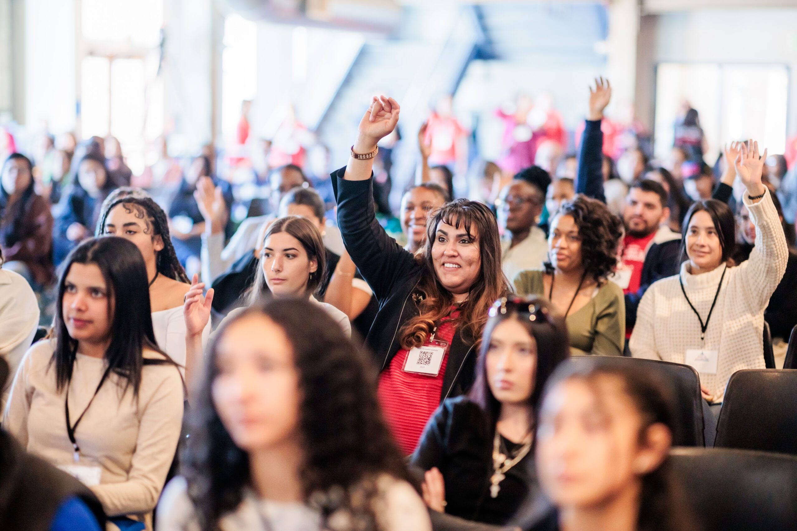Student raising their hands