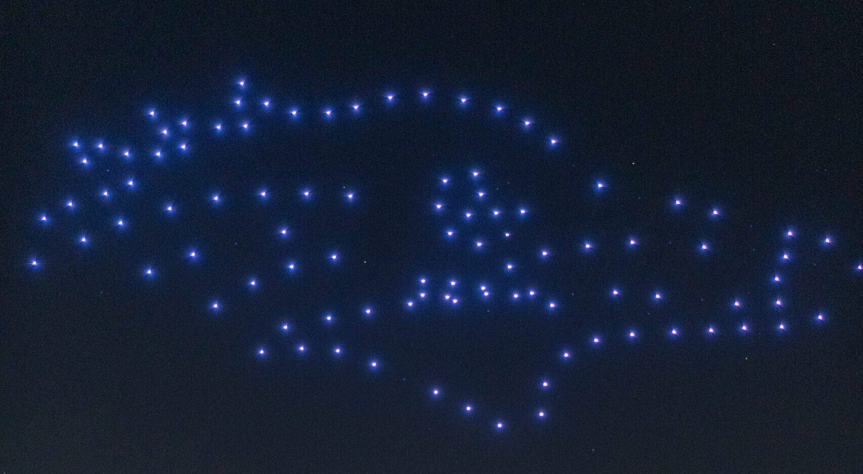 A Rowdy head forms in the sky using drone technology at the Homecoming Women's Soccer game