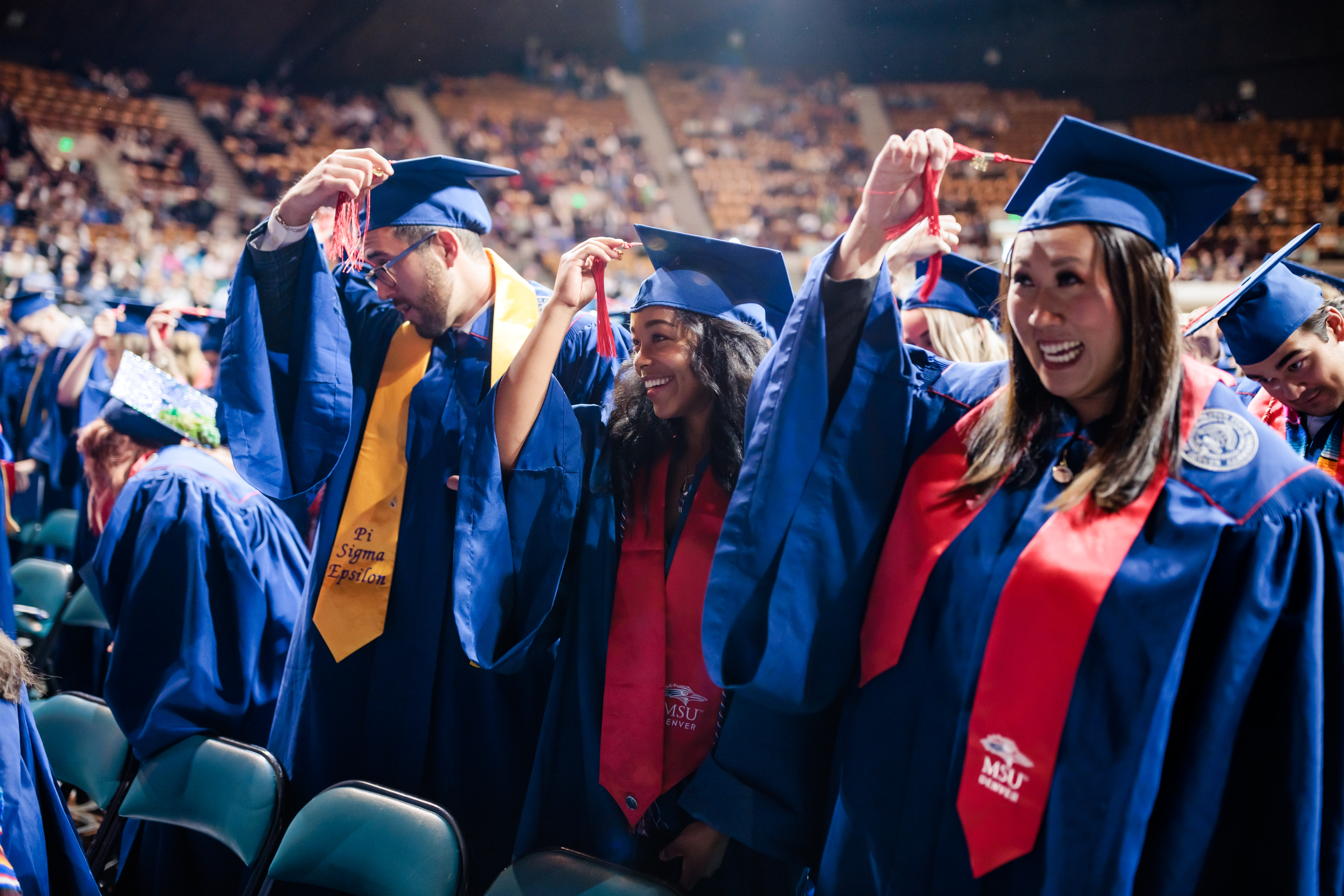 Graduates celebrate by turning their tassels at Commencement