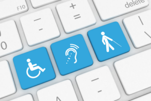 white keyboard with three blue buttons with icons of wheelchair logo, an ear with sound waves coming out to replicate hearing aid, and a person walking with a mobility cane.
