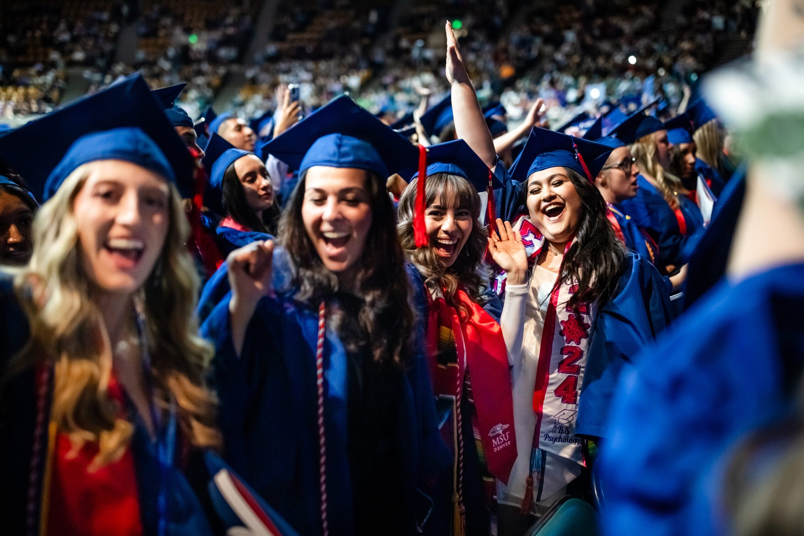 A group celebrate at the Commencement ceremony.