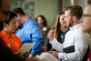 Student networking with employer at the MSU Denver Job Fair