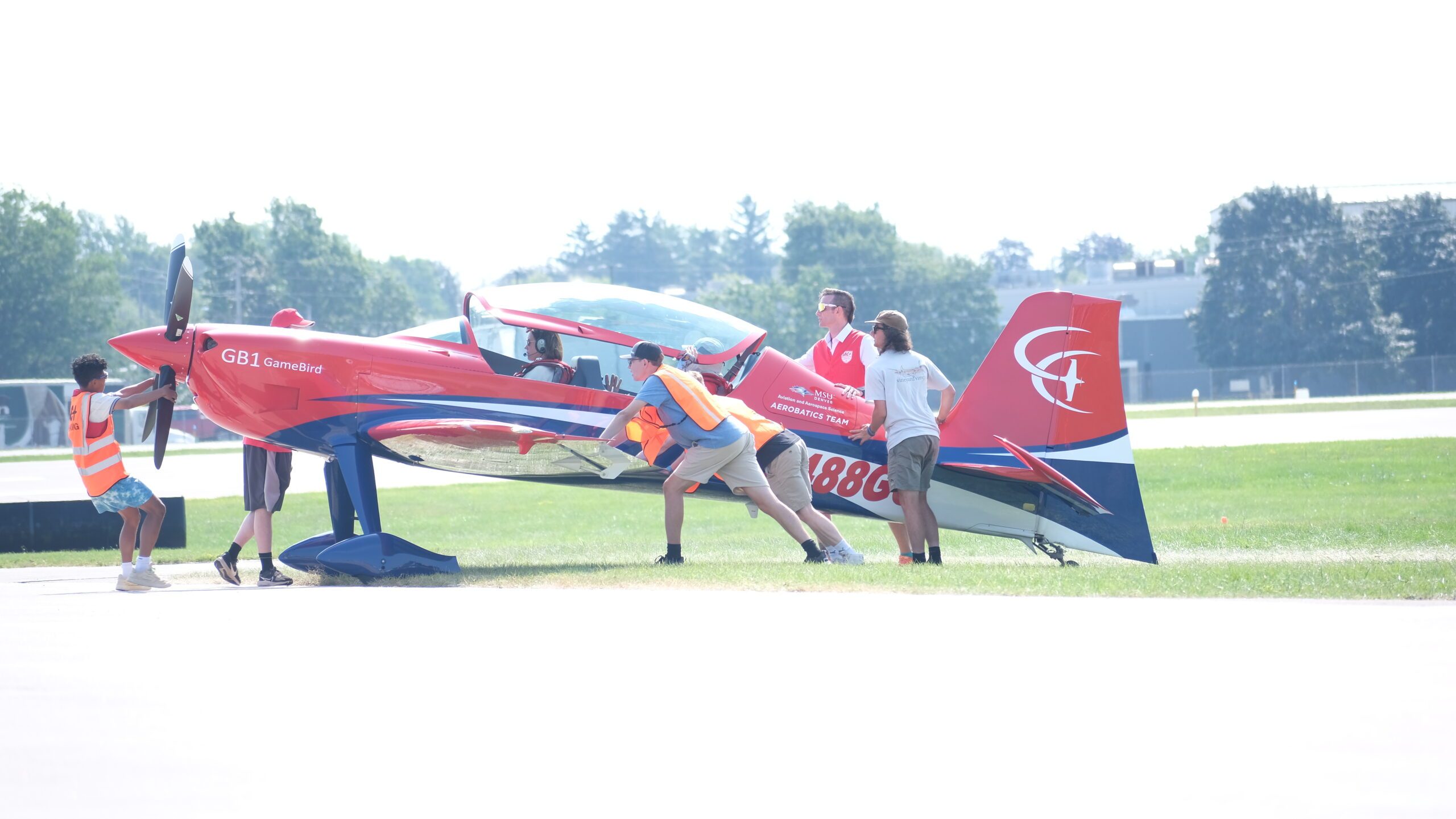 Members of the MSU Denver Aerobatics team prepare to fly.