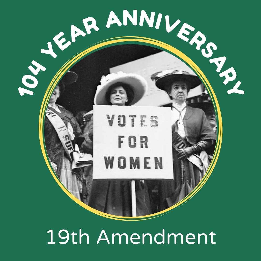 Green Background with 3 suffragettes in the middle holding a sign that says, 