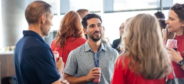 MSU Denver Staff and Faculty mingle at an event.
