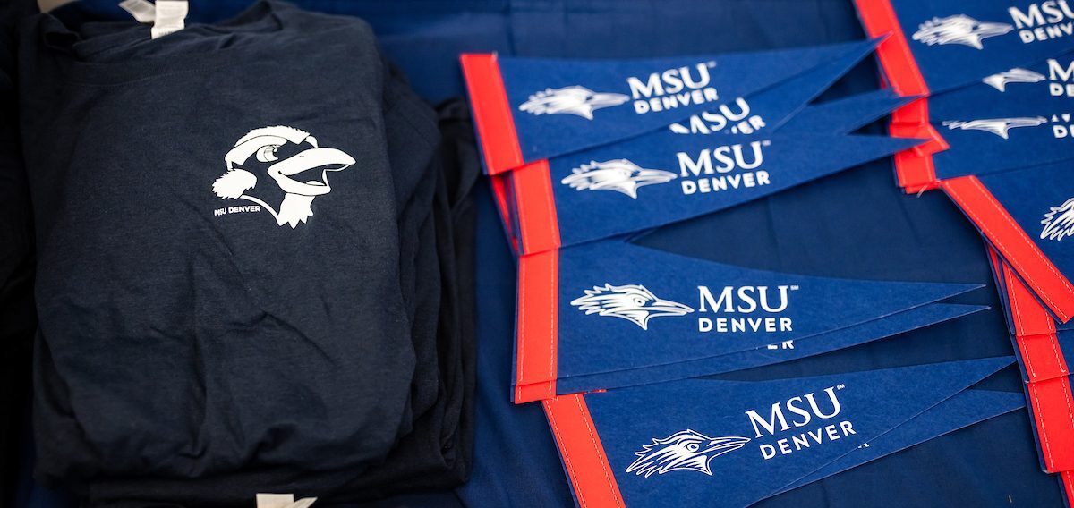 MSU Denver Pennants and Navy Blue T-Shirts with cartoon rowdy on them.