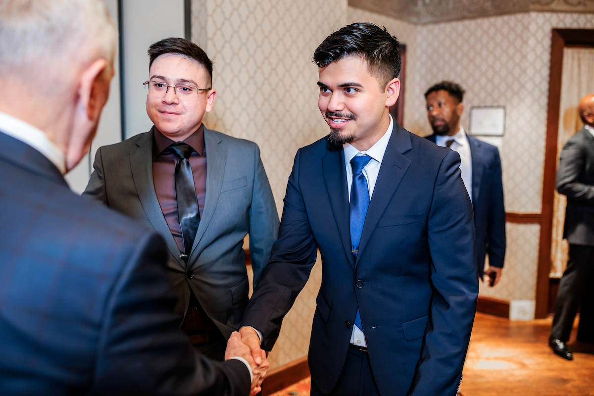 Two MSU Denver students shake the hand of Jim Mattis General, United States Marine Corps (Ret) & 26th Secretary of Defense