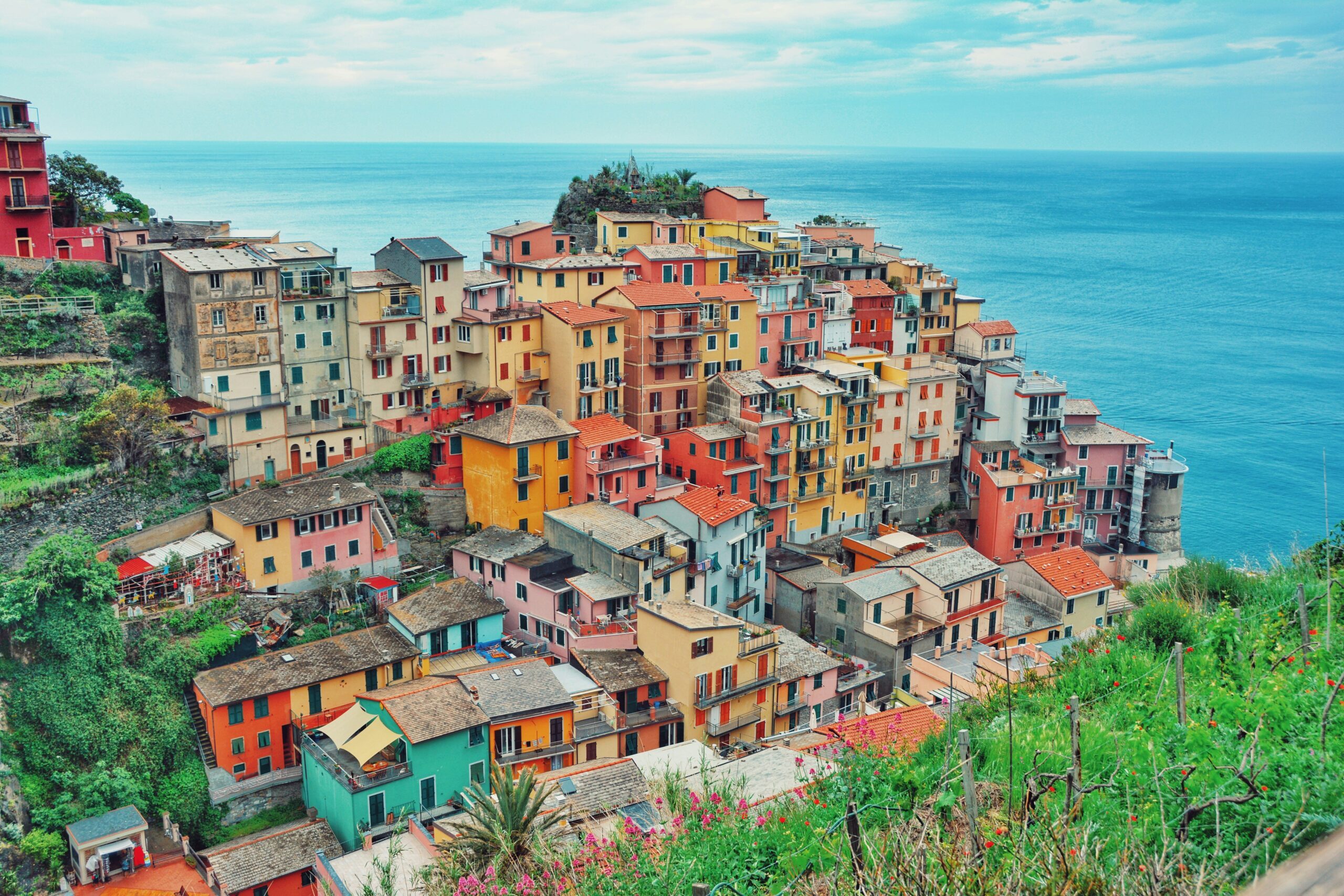 The MSU Denver Office of International Studies has programs in Cinque Terre (Italy) which is seen here appearing on a rugged coastline