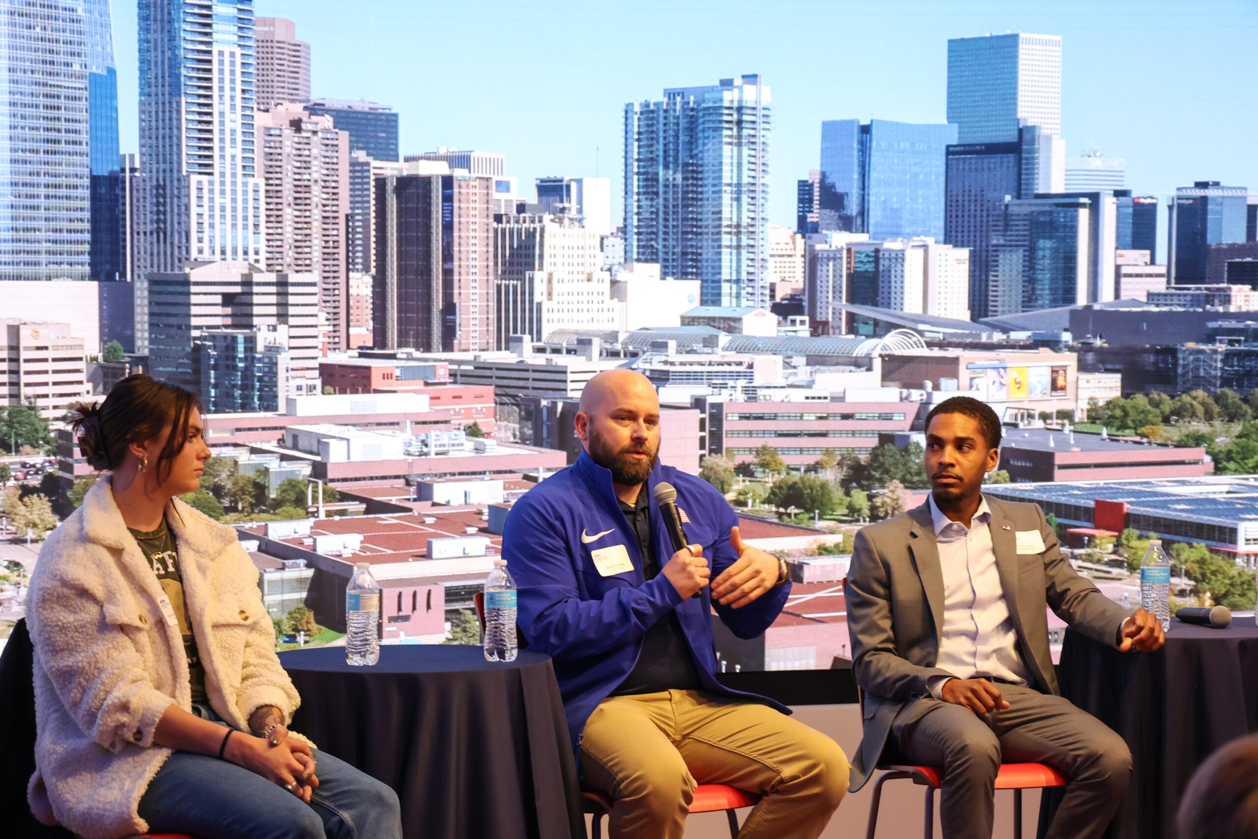 L to R: Katherine Pottinger, Event Coordinator for Copper Mountain; Brad Birling, Manager of International Teams and Logistics at USA Track & Field; Preston Askew, Inside Sales Rep, Colorado Avs and Mammoth speak as part of an alumni panel at the inaugural Irv Brown Sport Conference at MSU Denver on Oct. 31. Photo: Andrew Schlichting