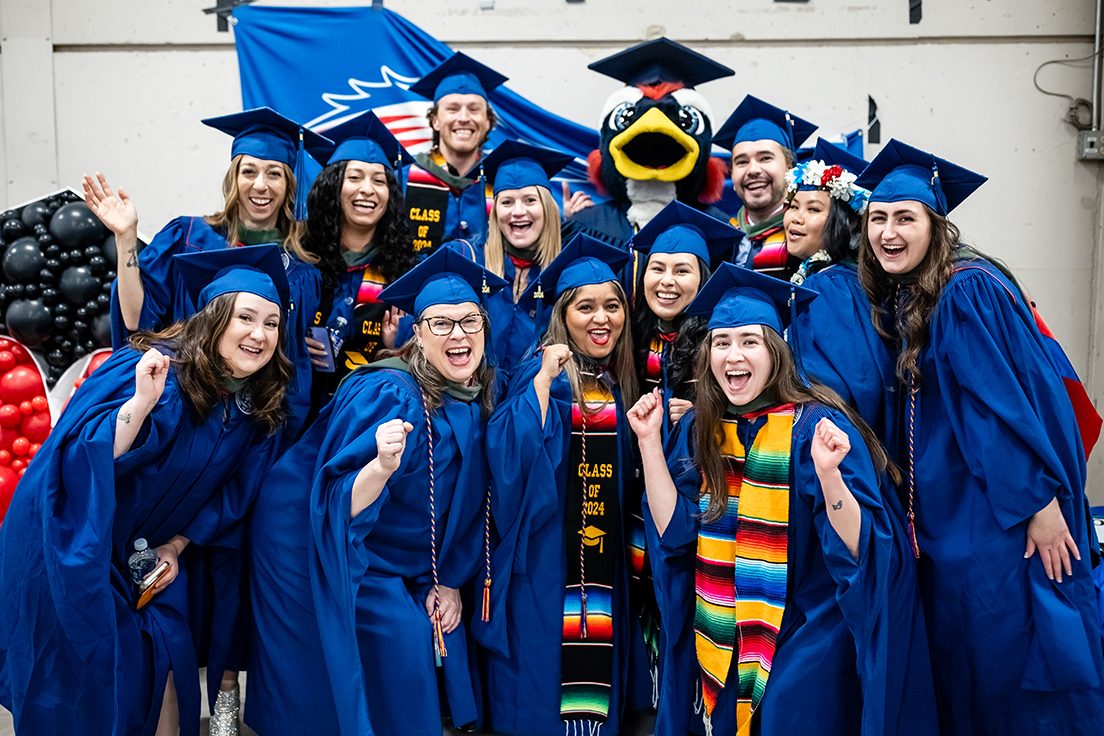2022-2024 MS SLP Cohort posing with Rowdy the Roadrunner at the MSU Denver Spring 2024 Commencement Ceremony