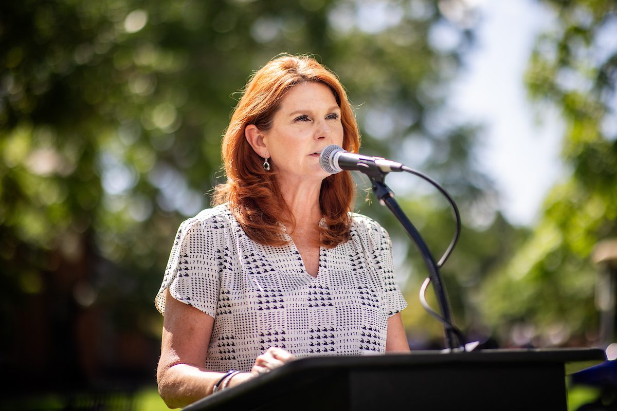 Dean Hope Szypulski speaking at a podium